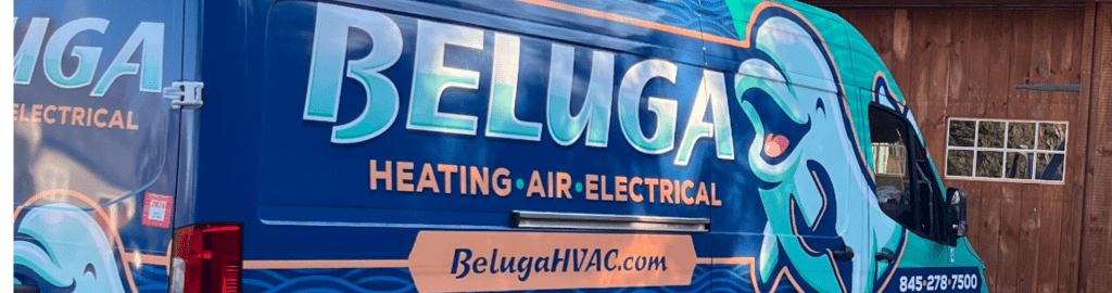 A branded Beluga van sits outside a residential home.