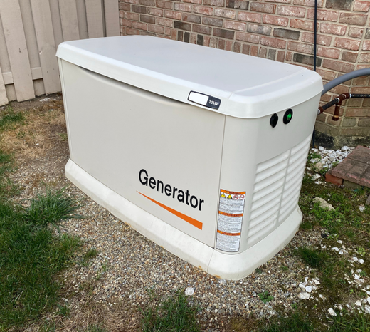 A Generac generator installed outside in mild weather. Introducing the idea that the best time to install a generator is before you need it, i.e. severe weather.