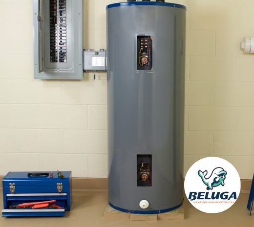 A blue tool box sites beside a residential water heater.