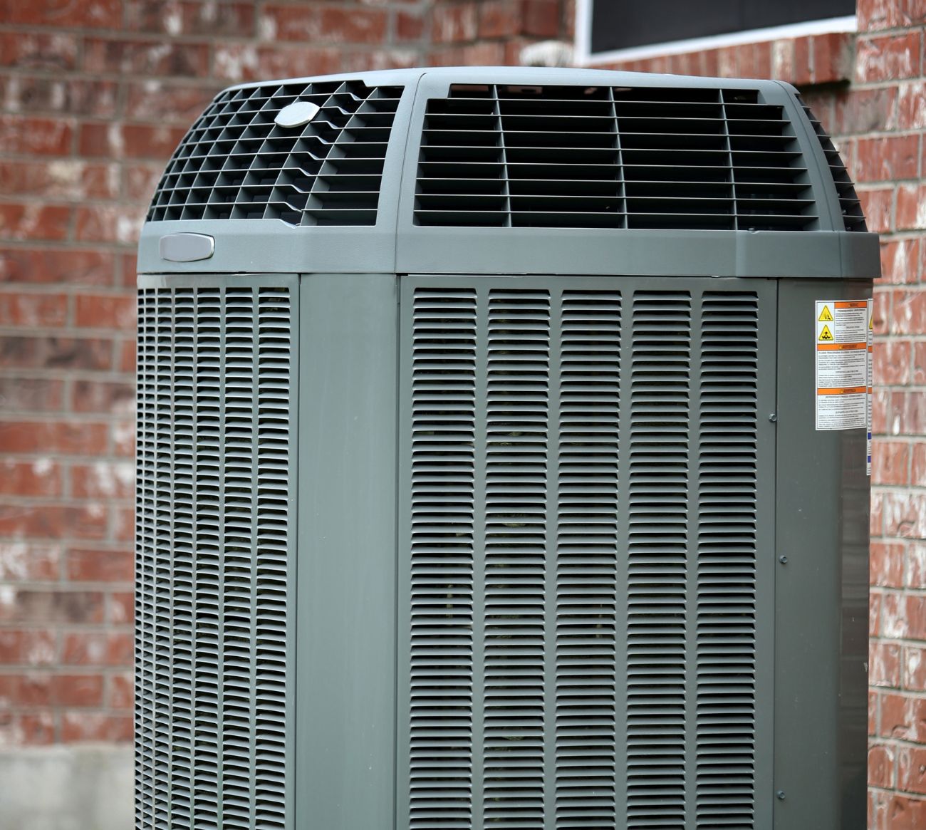 A close up image of a newly installed air conditioner.