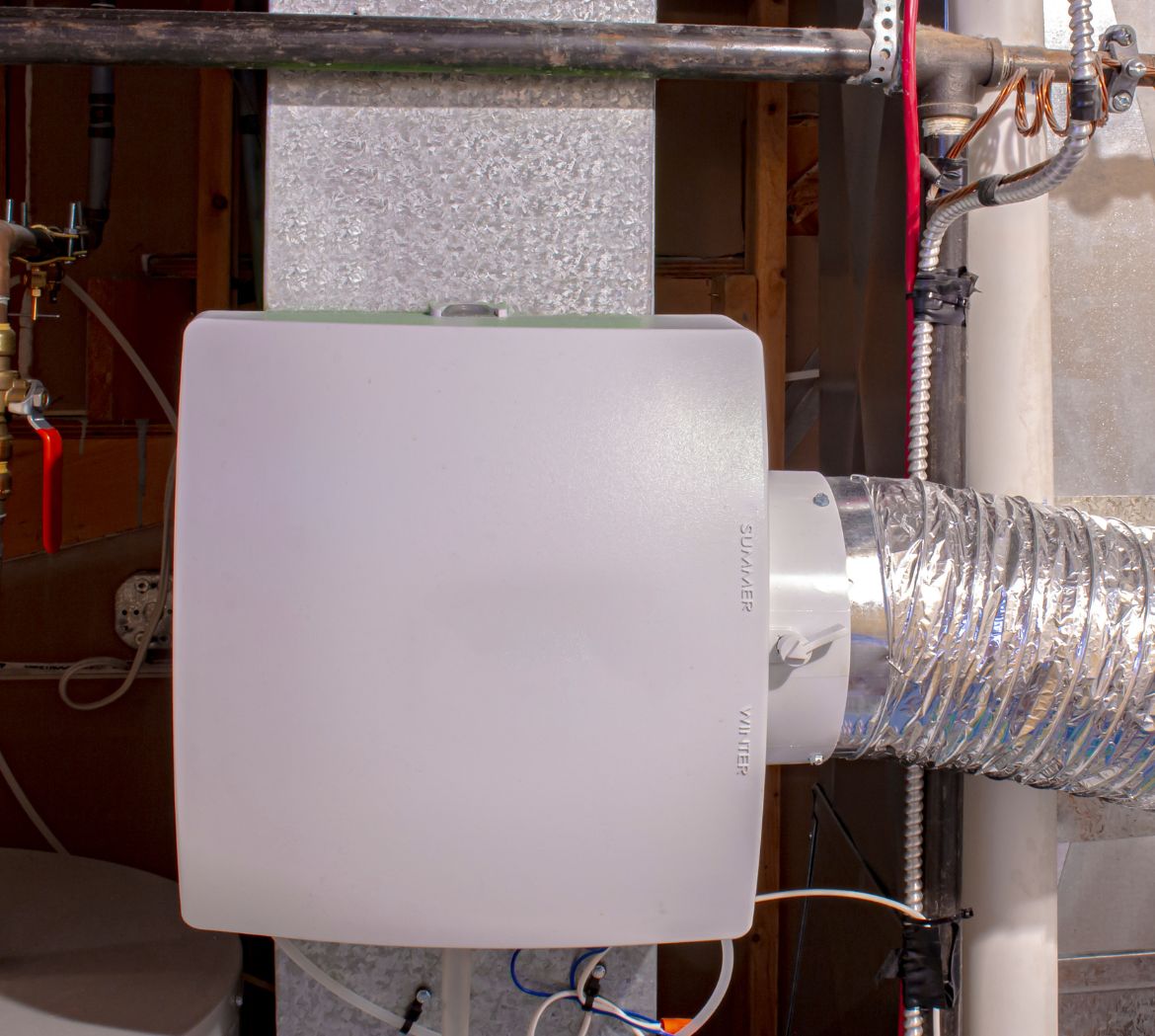 A whole-home humidifier connected to a furnace
